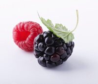 A blackberry and a raspberry
