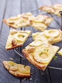 Tarte flambée with apples, almonds and thyme