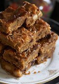 Caramel brownies with macadamia nuts and cranberries
