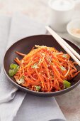 Fried grated carrots with sesame seeds and coriander (Asia)
