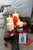 Decoration suggestion: modern Advent wreath of candles on wooden board