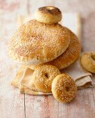 Sesame flatbreads, sesame bagels and a poppy seed bagel