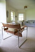 Sofas & metal chair with leather cover in polygonal living room