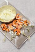 Prawns on cocktail sticks with dip