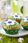 Fairy cakes with football decorations