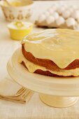 Boston Cream Pie, sponge cake with a vanilla cream filling and a white chocolate glaze