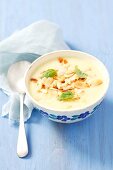 Creamy leek & pear soup with sliced almonds