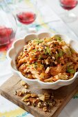 Pasta with cheese, pine nuts and fennel