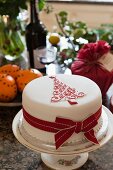 Festive Christmas cake on cake stand