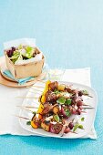 Lamb skewers with potatoes, olives and ewe's cheese (Greece)