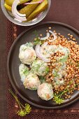 Chicken dumplings with buckwheat and a dill sauce