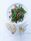 Bean and chard salad with mange tout and a lemon and mustard dressing