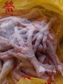 Fresh chicken feet in a plastic bag