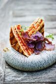 Club sandwich with vegetable crisps