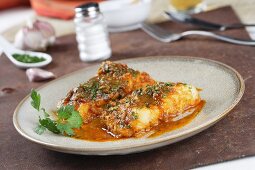 Cod with a garlic sauce and parsley (Spain)