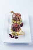 Lamb rolled with peppers, served on tabbouleh