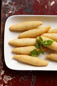Corn fingers with grated coconut
