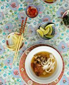 Asian soup with noodles and meat