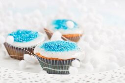 Christmas cupcakes decorated with blue sugar