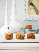 Smoked salmon, avocado and red onion sandwiches