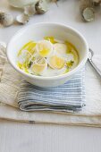 Radish soup with quails eggs