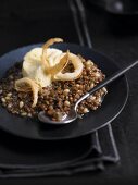 Creamy lentil risotto with butter ice cream and fried white onions