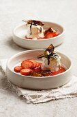 Baked goat's cheese with white chocolate, strawberry sauce and aubergine