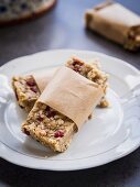 Homemade peanut butter power protein bars with oats, honey, cranberries and nuts.