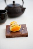 Wagashi snake (Year of the Snake) with a teapot (Japan)
