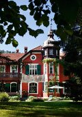 Sun shining on restored facade of manor house in southern German