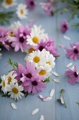Wreath of pink and white daisies