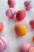 Dyed Easter eggs wrapped with yarn