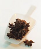 Star anise in a plastic scoop