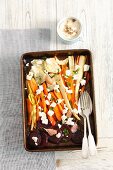 Oven-roasted vegetables with feta and olive oil (view from above)