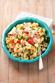 Tortellini salad with ham, tomatoes, cucumber and mayonnaise