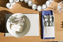 Laid table with cutlery pocket and name tag