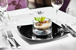 Fried goose liver with celery in a restaurant