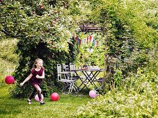 Girl at childrens party in garden