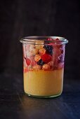 Calissons dessert with berries in a glass