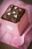 Mini chocolate cake with sugar hearts