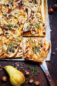 Pear and cheese tart with hazelnuts