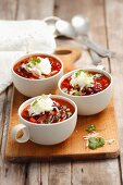 Kidney bean soup with peppers, yoghurt and cheese