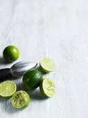 Limes, whole, halved and squeezed