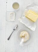 Various baking ingredients (butter, flour)