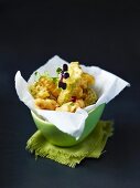 A bowl of tempura with cress