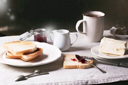 Breakfast with toast, jam and butter