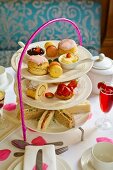 Cake, desserts, sandwiches and drinks for high tea