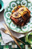 Marinated salmon fillets with soy sauce and oranges