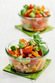 Summery vegetable salads with tomatoes, avocado and carrots