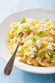 Tagliatelle with feta, lemon and basil